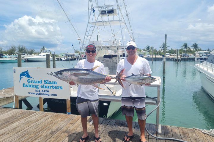 a man sitting on a boat in the water