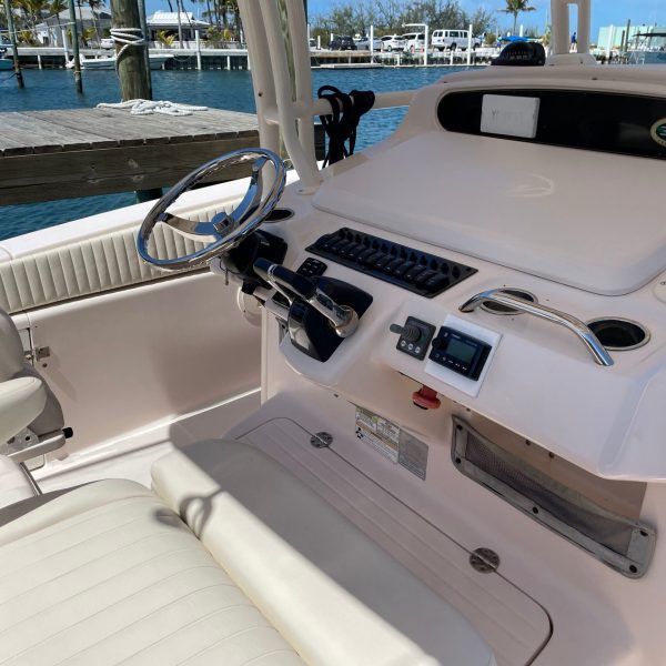 a boat that is sitting on the side of the road