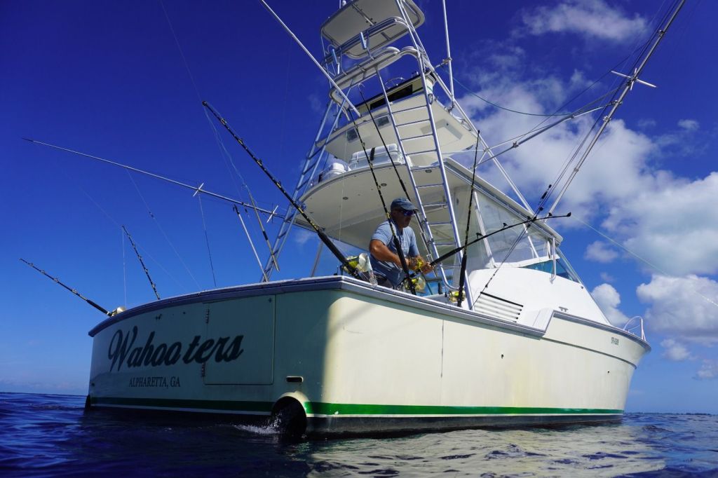 a truck cake sitting on top of a sandy beach