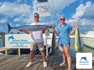 a man holding a fish