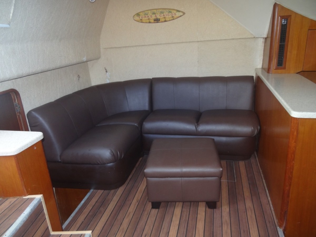 a chair sitting in front of a wooden table