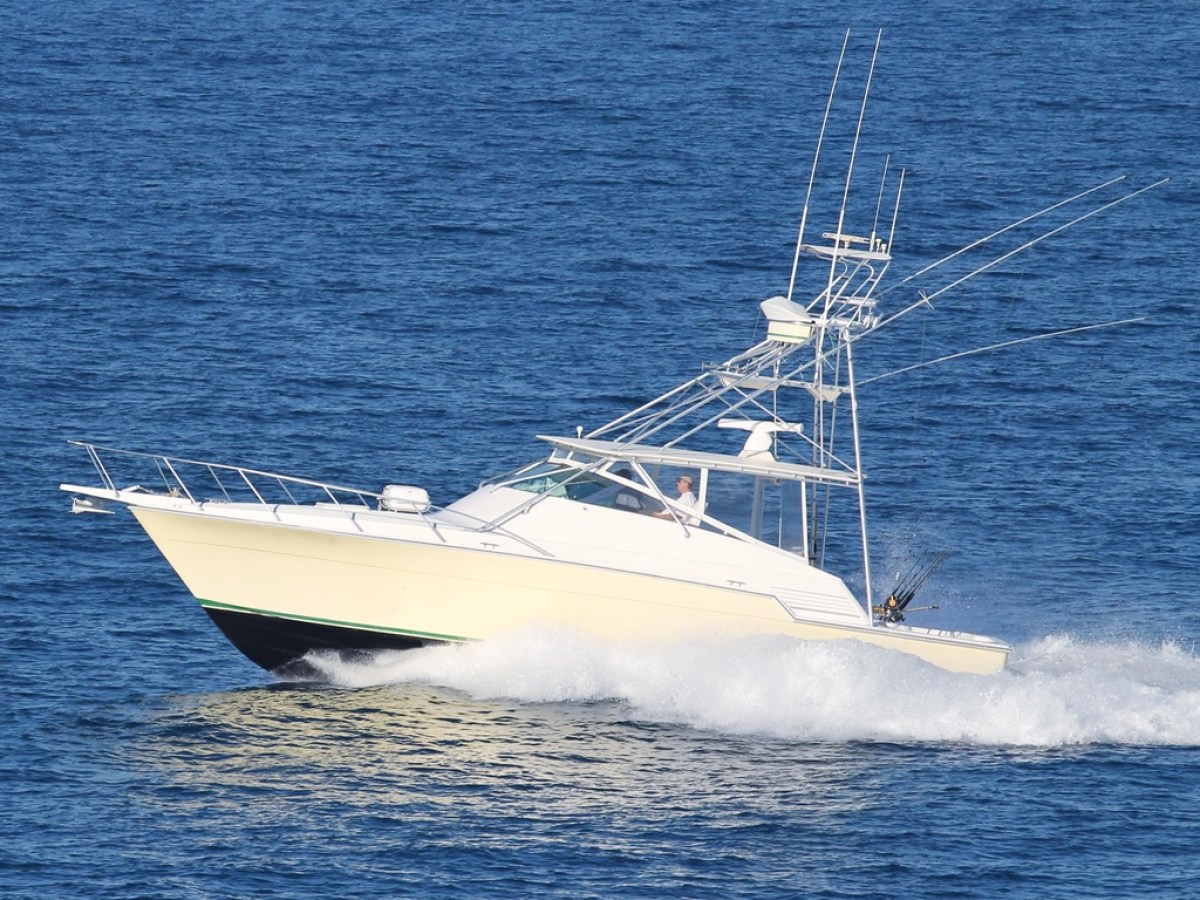 a small boat in a large body of water