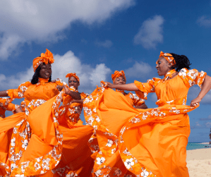 a group of people in orange shirts