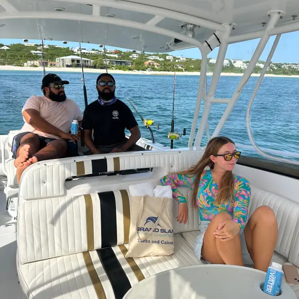 a group of people sitting on a boat