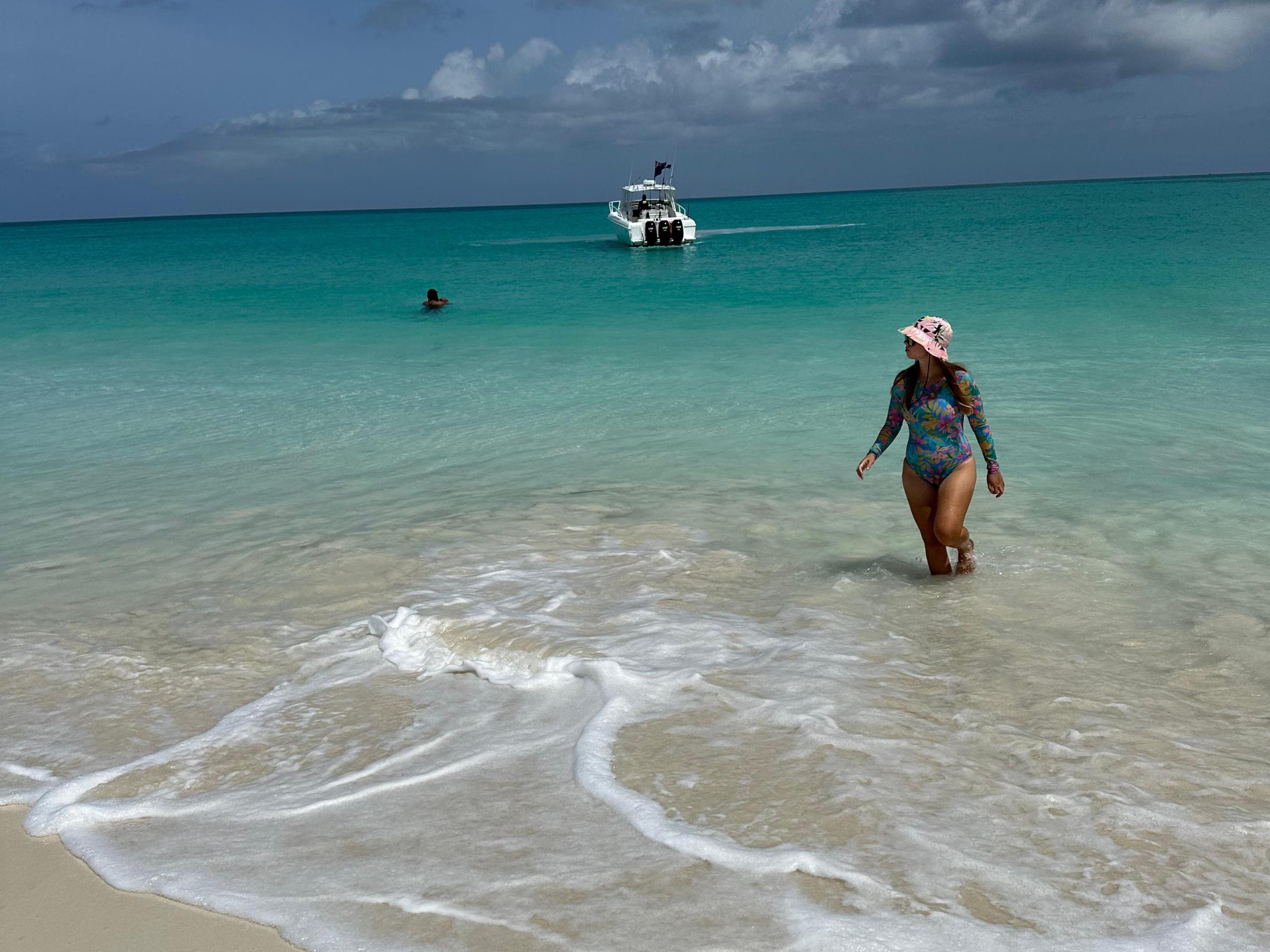 a man riding a wave on top of a body of water