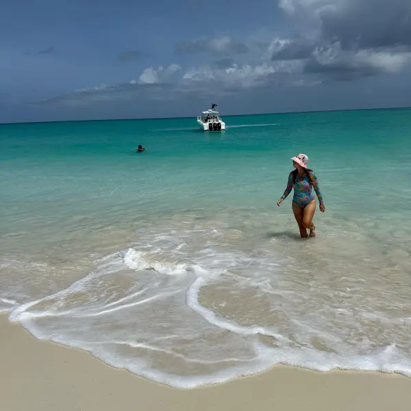 a man riding a wave on top of a body of water