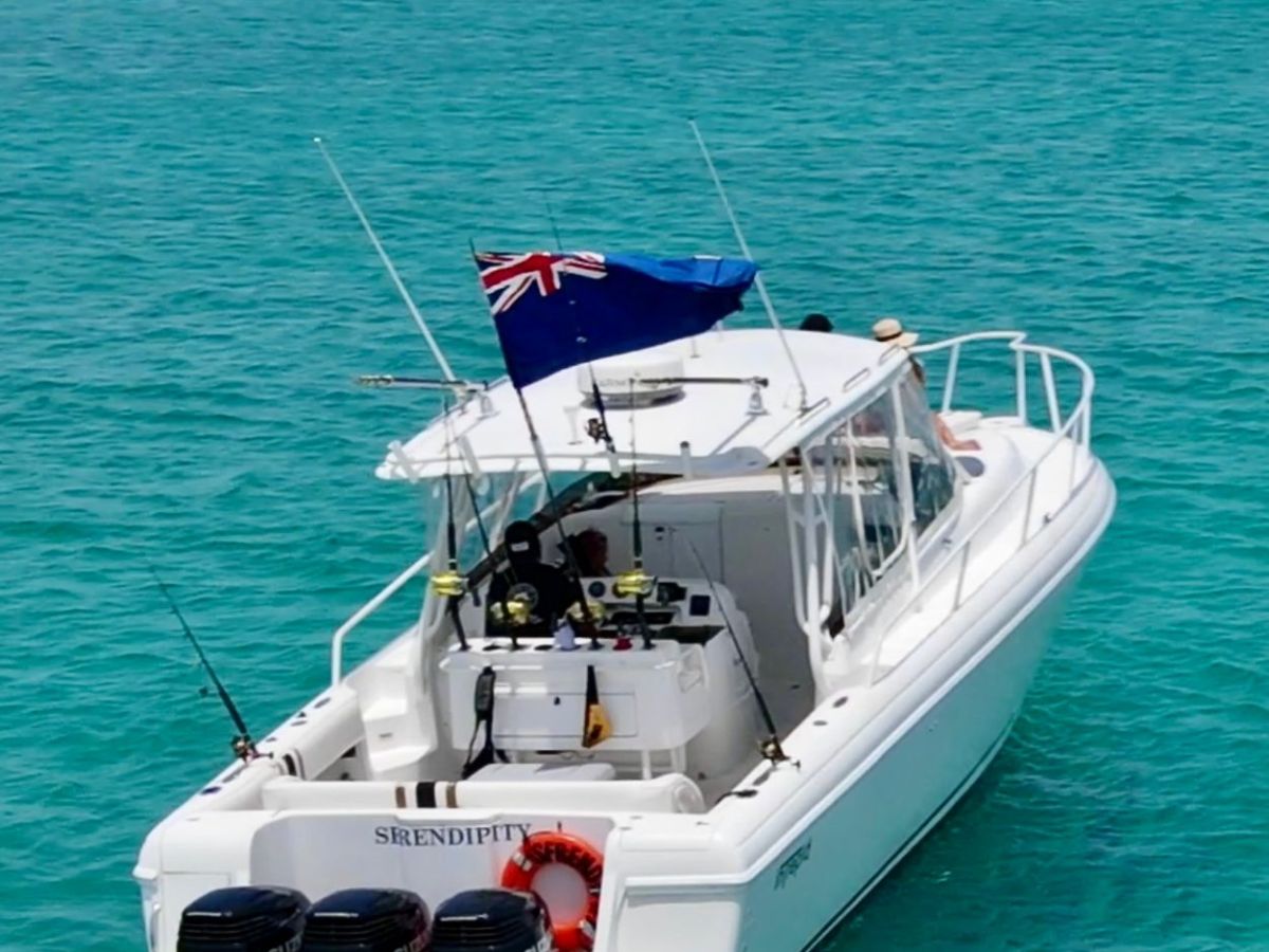 a small boat in a large body of water