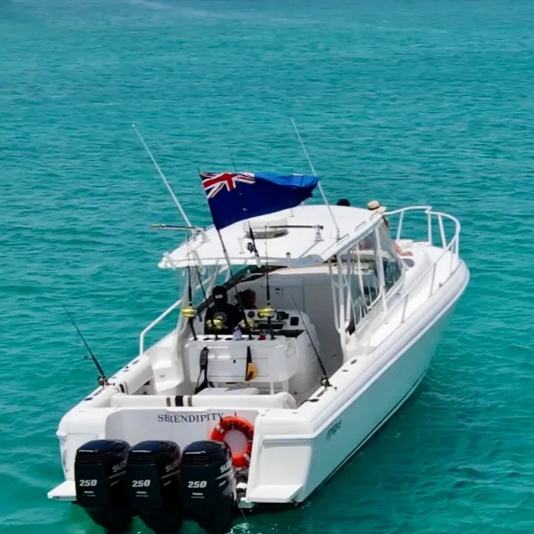 a small boat in a large body of water