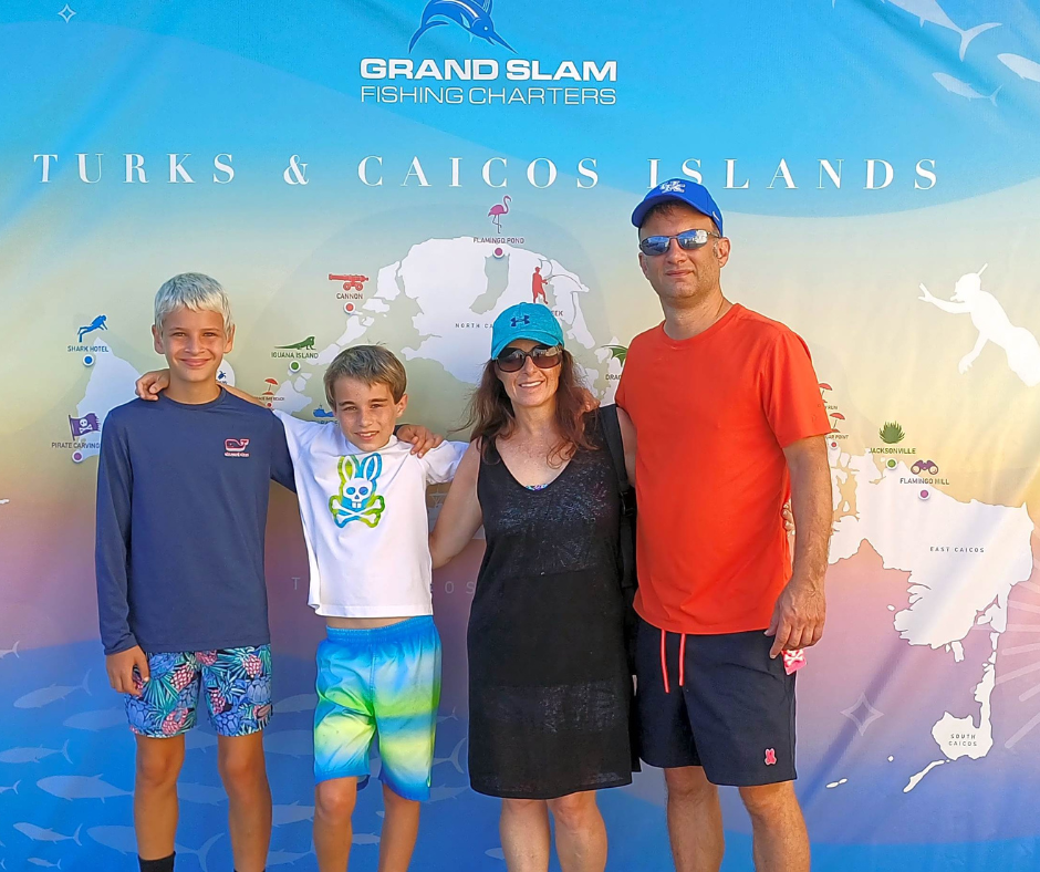 How Many Turks and Caicos Islands a group of people posing for a photo