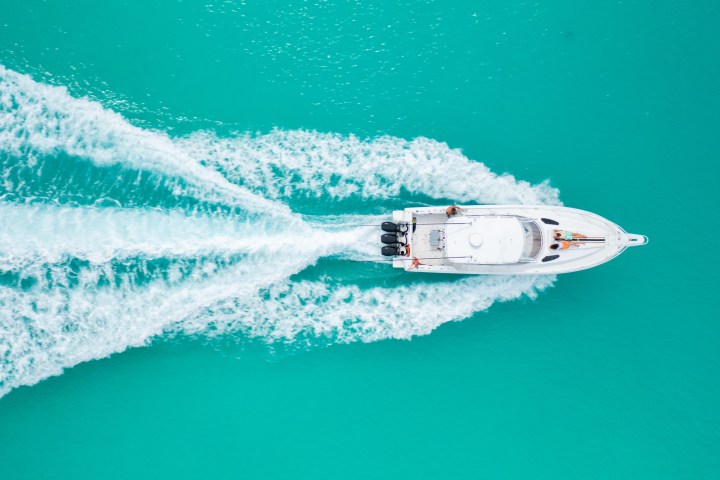 a person riding a wave on a surfboard in the water