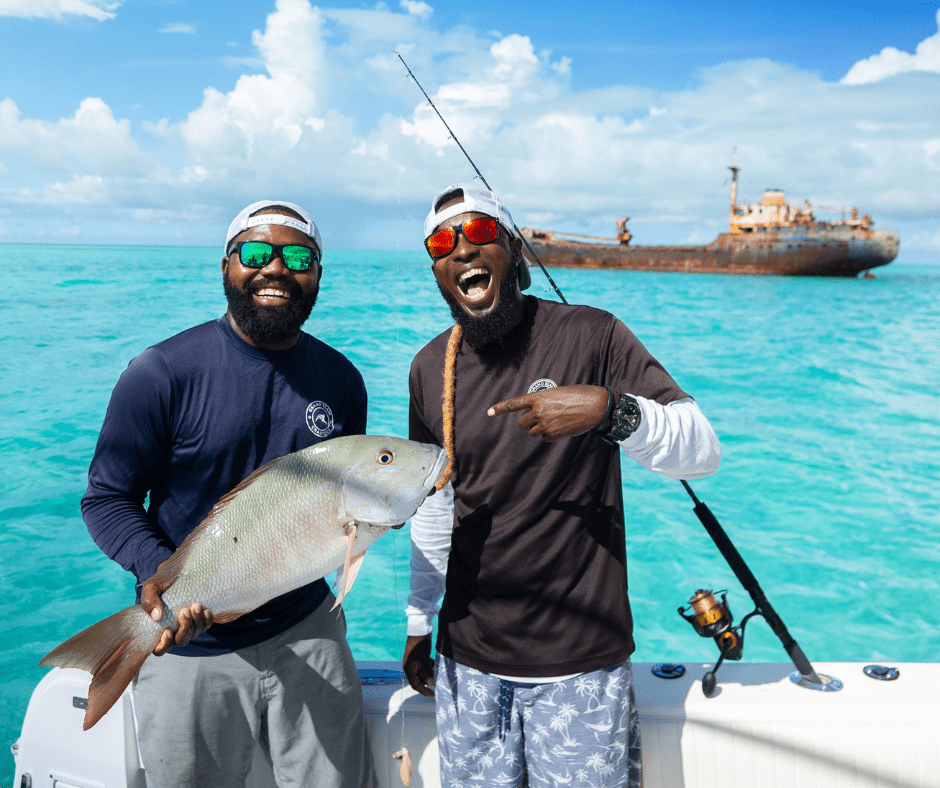 Top Places for Fishing in 2025 a man holding a fish on a boat in a body of water