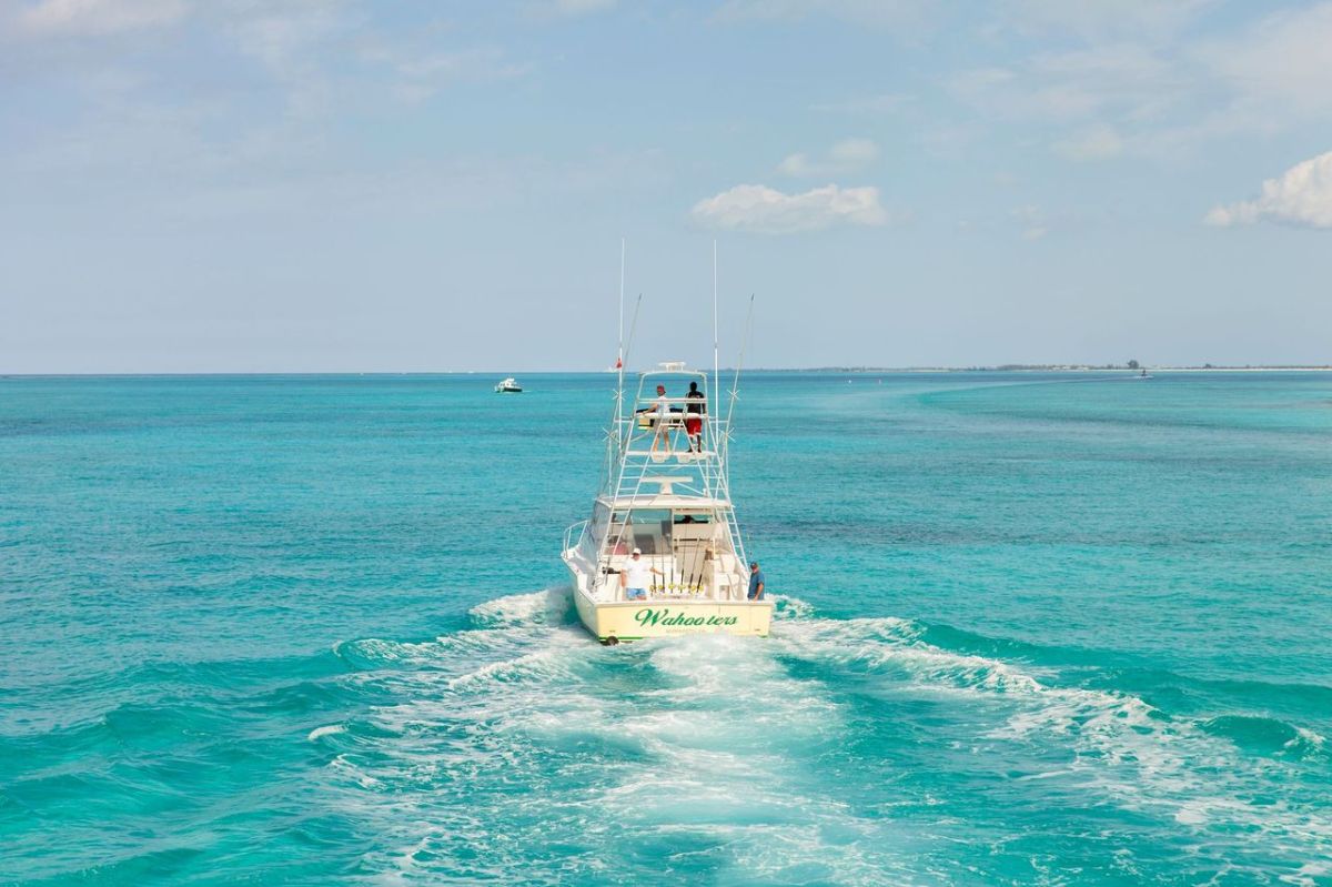 14 a small boat in a body of water