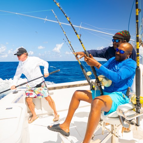 a group of people on a boat in the water