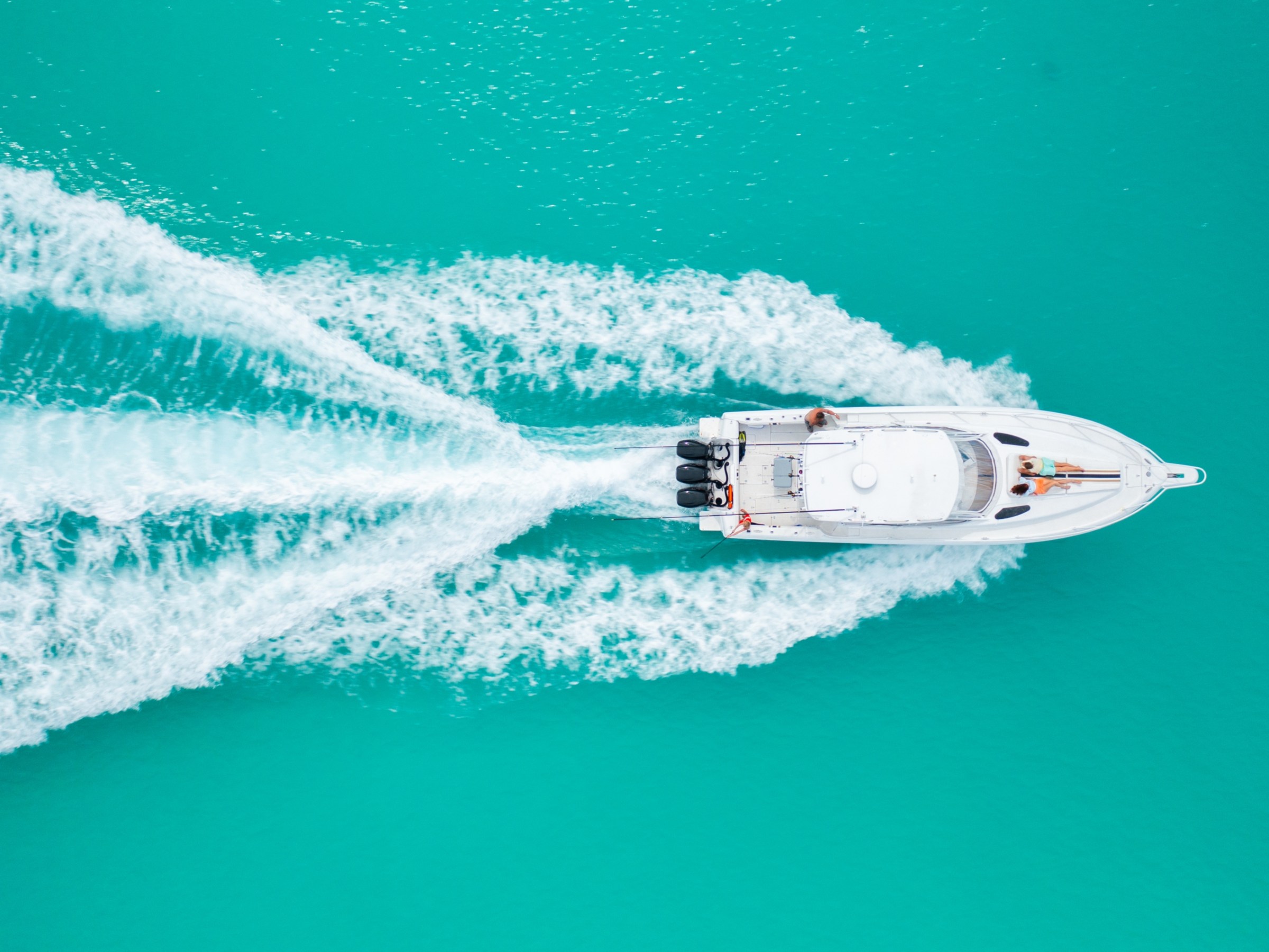 a person riding a wave on a surfboard in the water