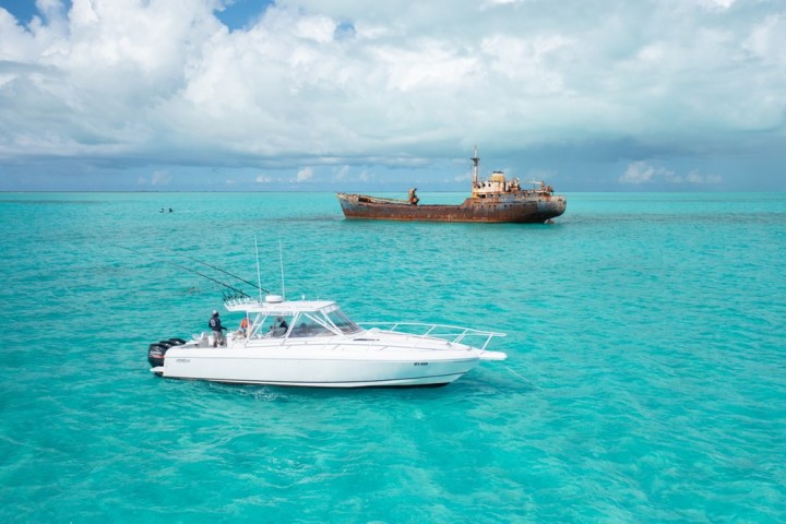 a small boat in a large body of water